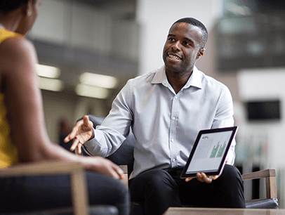 Man giving sales pitch with iPad