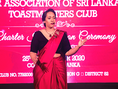 Woman speaking onstage