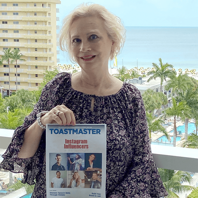 Katherine Eaton of Tallahassee, Florida, celebrates her 40th wedding anniversary in Marco Island, Florida. She printed out the May 2021 cover of the <em>Toastmaster</em> magazine for this photo!