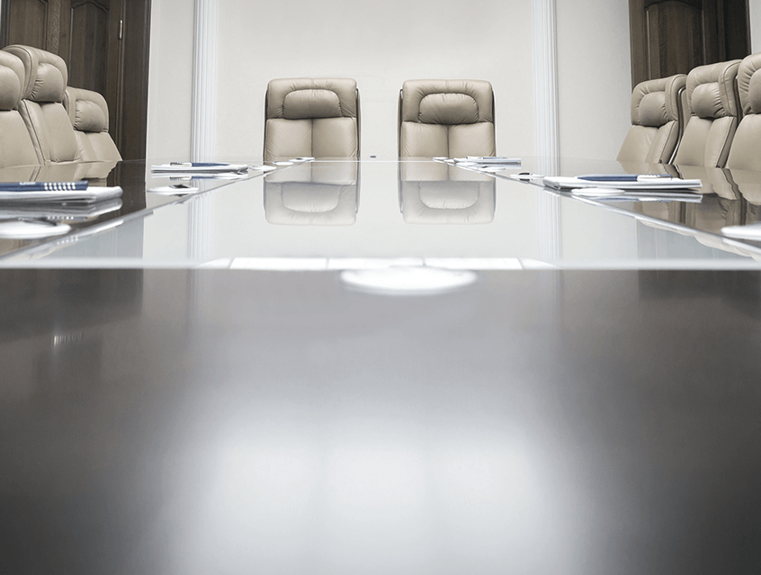 Empty chairs in board room