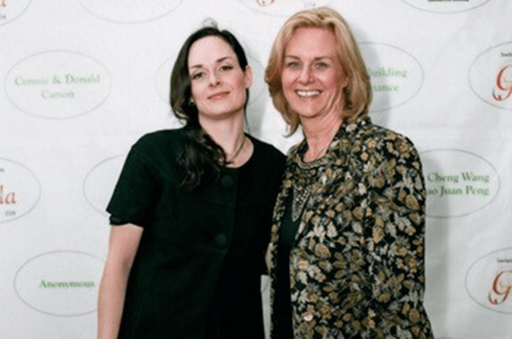 Page and her daughter, Corrine, smile on the red carpet at a gala event.