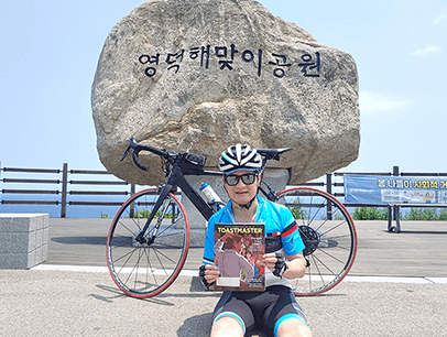 Sean Jung, DTM, of Seoul, South Korea, completes a 76-kilometer (47.2-mile) bicycle ride at Sunrise Park in Yeongdeok, South Korea.