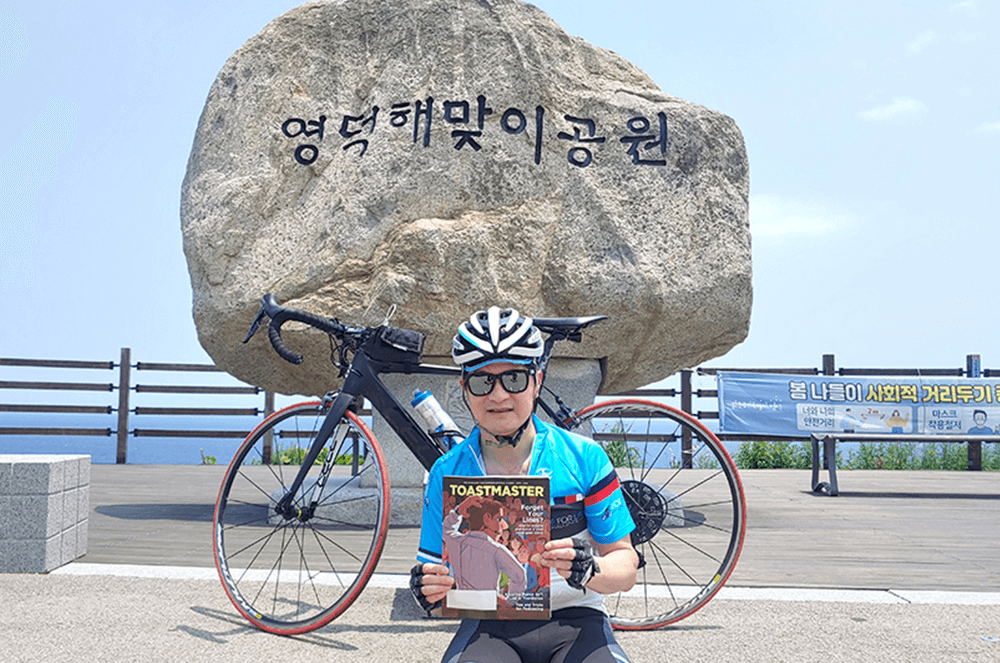 Sean Jung, DTM, of Seoul, South Korea, completes a 76-kilometer (47.2-mile) bicycle ride at Sunrise Park in Yeongdeok, South Korea.