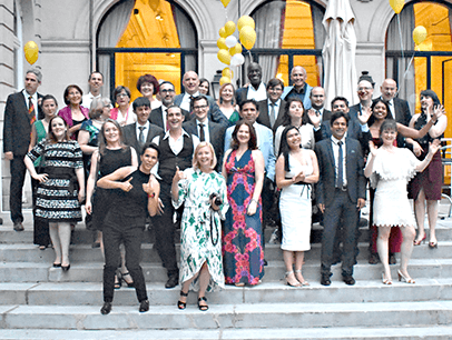 Group of people posing on steps