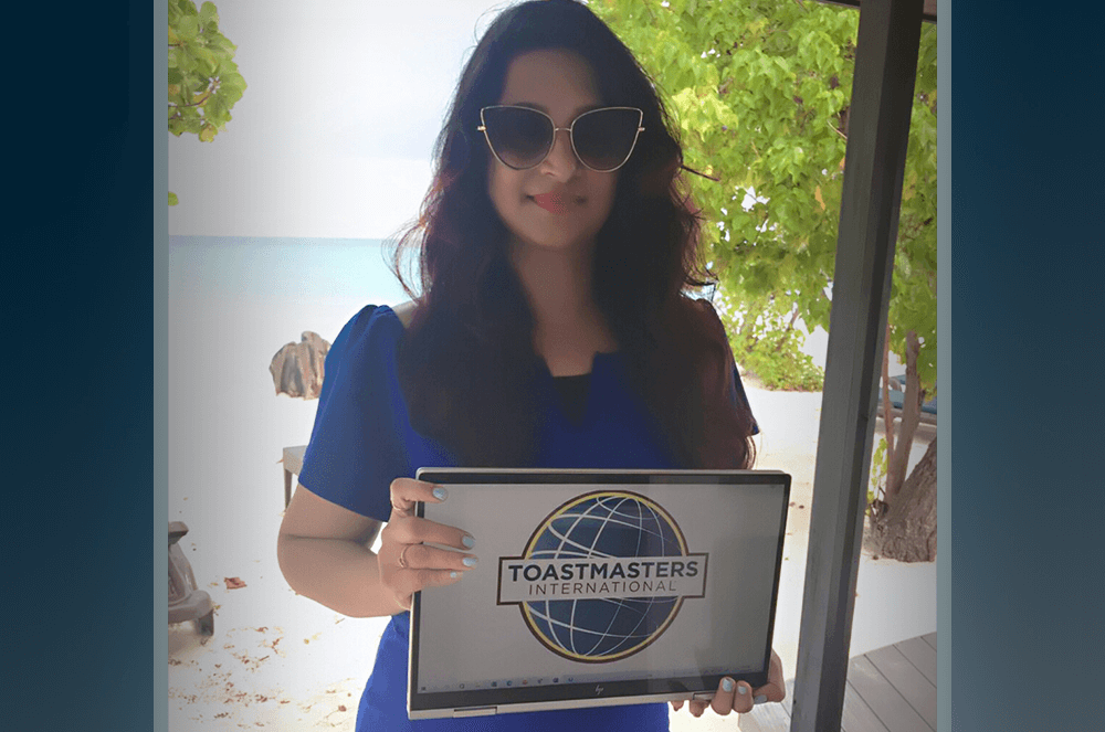 Mallika Dinesh Mada of Riyadh, Saudi Arabia, signs on for a Toastmasters meeting while vacationing in Kuredu, Maldives.
