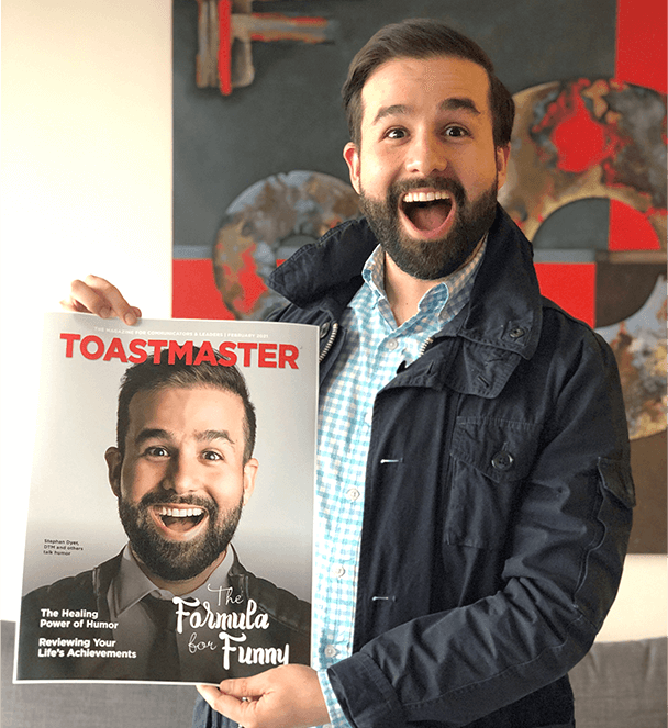 Stephan Dyer, DTM, of North York, Ontario, Canada, holds a printout of the February 2021 Toastmaster magazine cover he appeared on.
