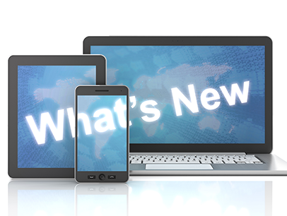 Laptop, tablet, and smartphone with what's new on screens