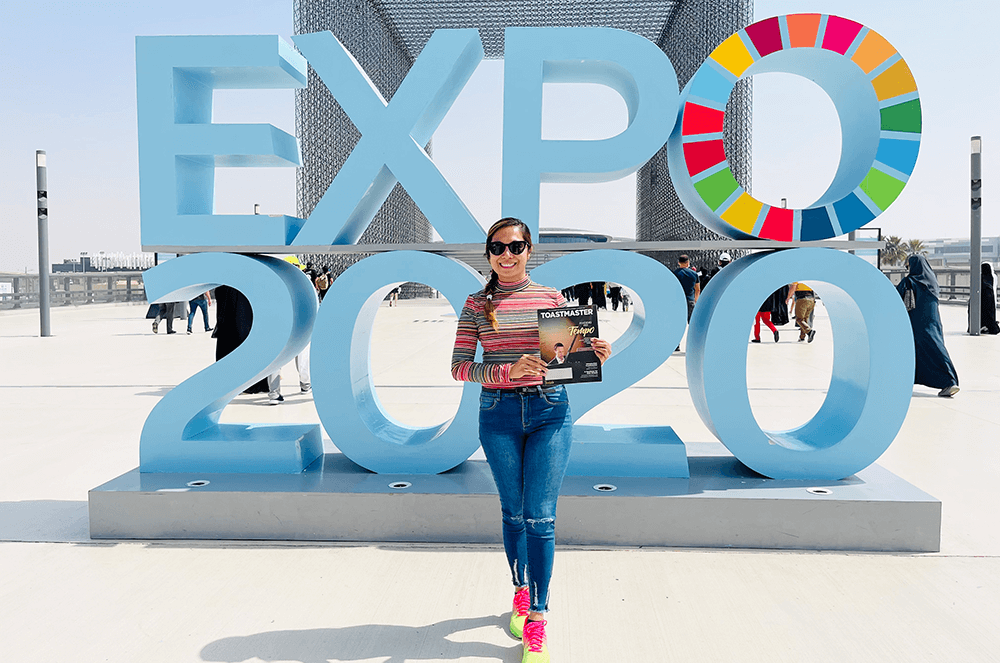 Neev Condes of Ajman, United Arab Emirates, poses at Expo 2020 in Dubai—a six-month event with pavilions representing 192 countries. Condes visited all 192 pavilions!
