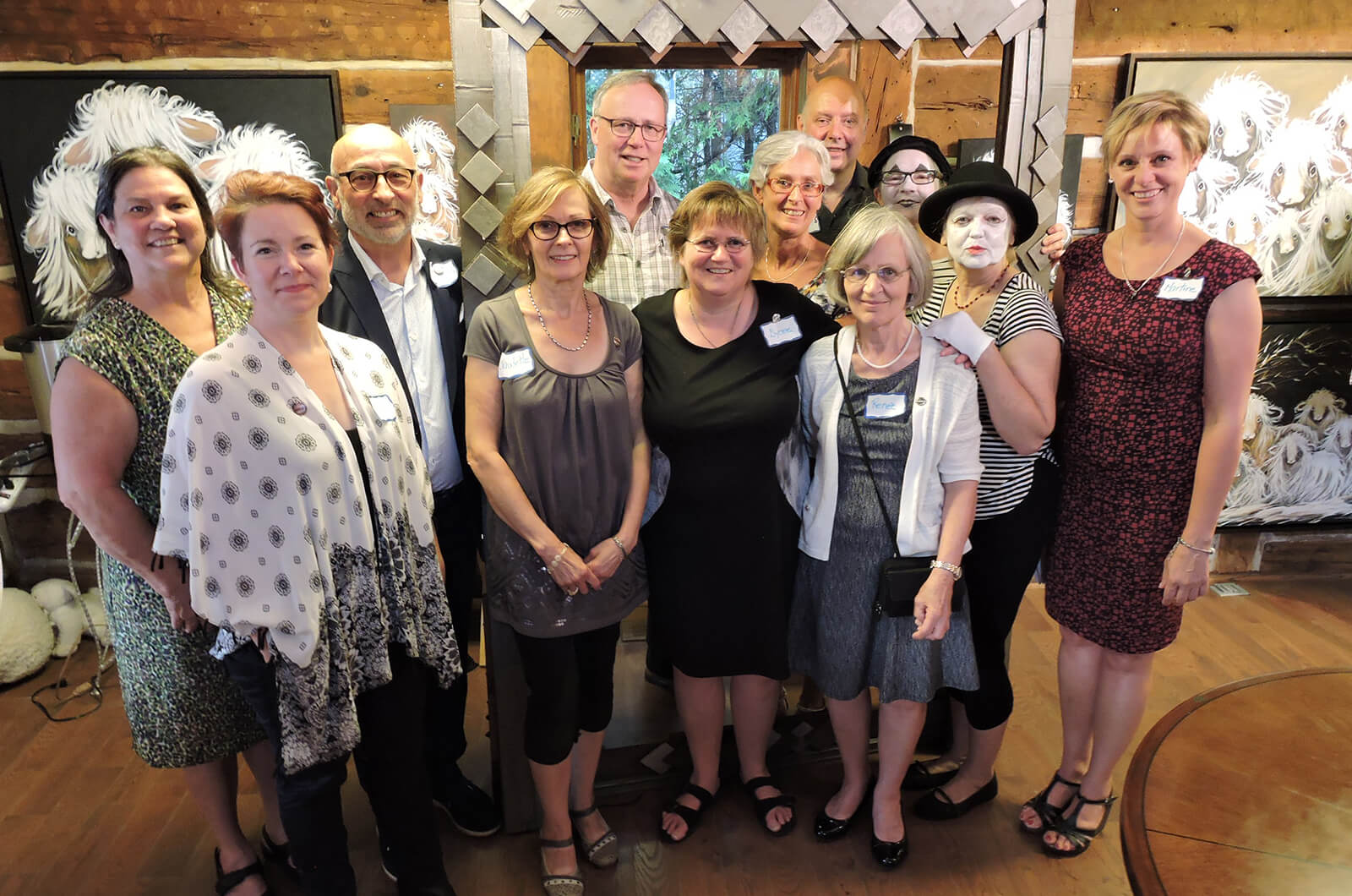 Members of Toastmasters des Laurentides club in Quebec, Canada, host an open house in the Art Gallery Béliveau for their 15th anniversary.
